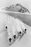 Five anonymous men skiing Five anonymous men skiing
