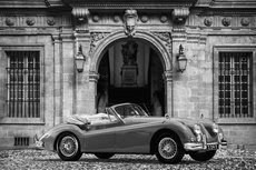 Luxury car front of Palace b/w Luxury car front of Palace b/w
