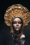 Mannequin in golden head wear Mannequin in golden head wear